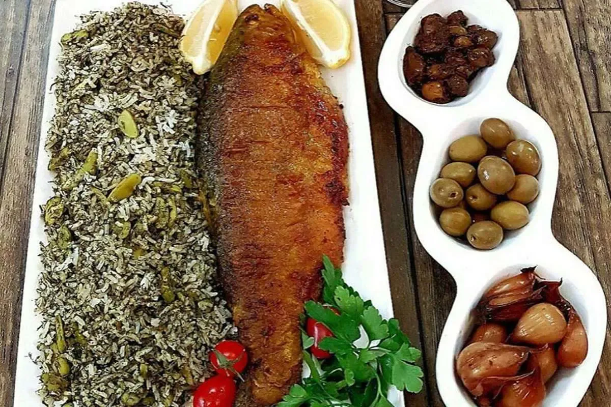 OWJmMDcnjUEV طرز تهیه سبزی پلو با ماهی شب عید با طعمی لذیذ و خاطره انگیز