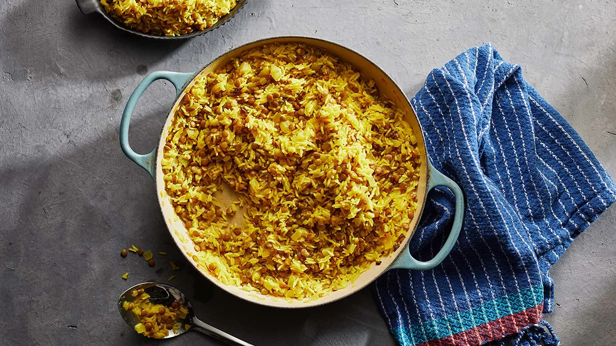 طرز تهیه عدس پلو با کشمش پلویی