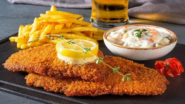 طرز تهیه شنیسل مرغ رستورانی ترد و خوشمزه در خانه